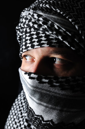 Man with arabic palestinian colors