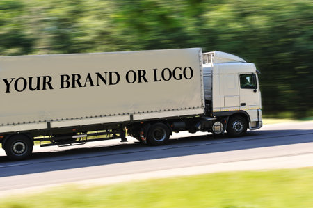 Big truck photographed from back side, no logo except great place for your logo or name of the brand