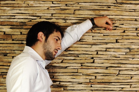 Young fashionable stylish man with a short beard posingの写真素材