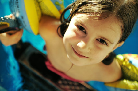 Little cute girl in pool