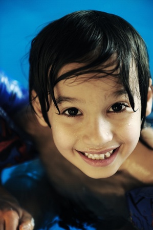 Kid in poolの写真素材
