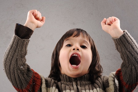 One kid - many faces, series of clever schoolboy 6-7 years old with facial expressionsの写真素材