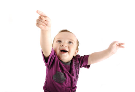 Llittle cute baby wants to fly into sky, isolatedの写真素材