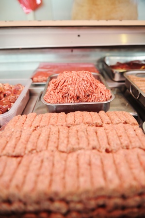 Assortment of meat at a butcher shopの写真素材
