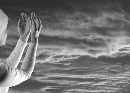 White prayer on blackの写真素材
