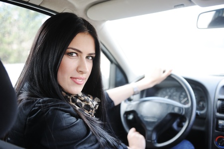 Woman Sitting In Car And Drivingの写真素材
