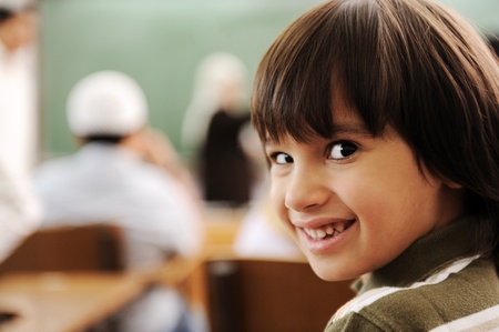 Education activities in classroom at school, happy children learningの写真素材