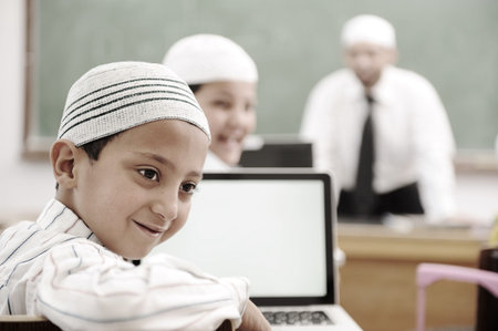 Education activities in classroom at school, happy children learningの写真素材