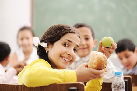 Education activities in classroom at school, happy children learningの写真素材