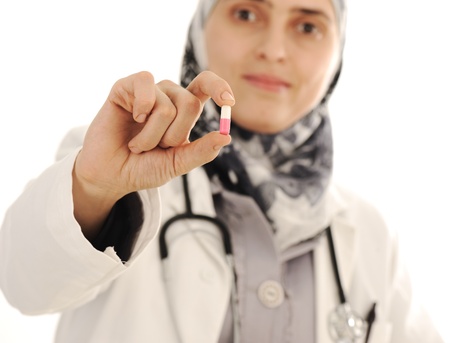 Doctor holding a pill, solution for you, closeupの写真素材