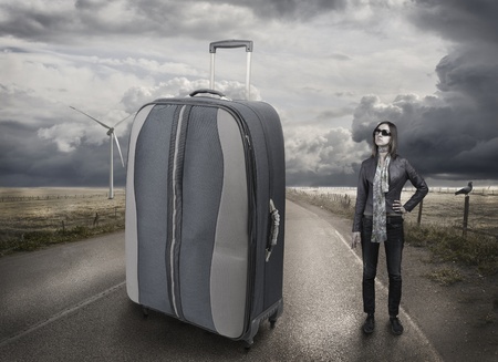 Girl on road, transportation, big bagの写真素材