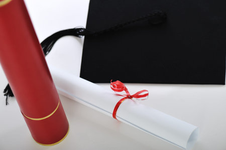 Diploma and graduating capの写真素材