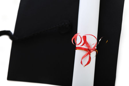 Diploma and graduating cap