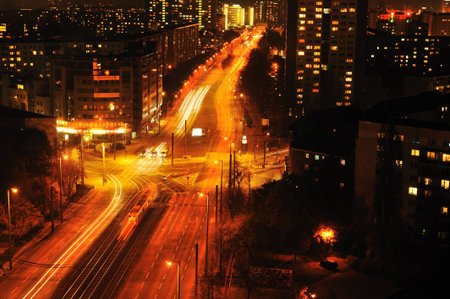 Modern Urban City at Night with Freeway Traffic