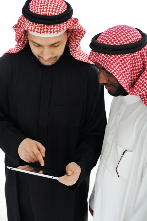 Business people planning work in office working on tablet computerの写真素材