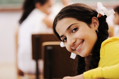 Children at school classroomの写真素材