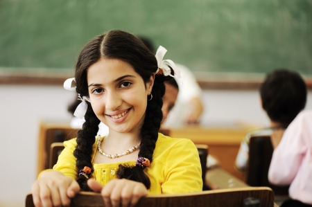 Children at school classroomの写真素材