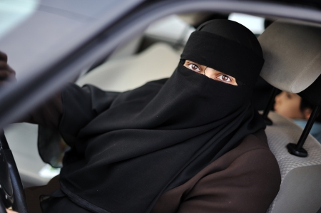 Muslim middle eastern female driver wearing veilの写真素材
