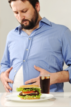 Fat man concerns about fast junk food Fat man concerns about fast junk food