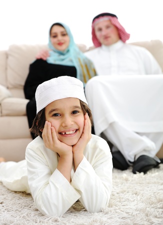 Happy Arabic family at homeの写真素材