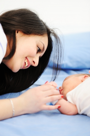 Happy mother with her babyの写真素材