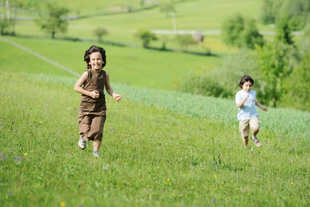 Kid on meadowの写真素材