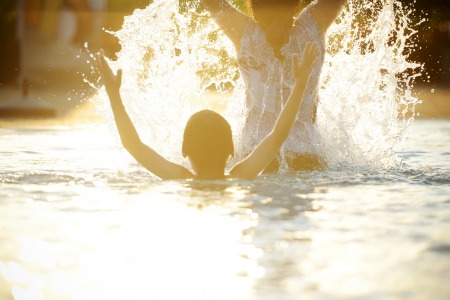 Children in water on hot summertimeの写真素材