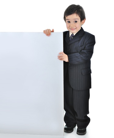 Little business boy with bannerの写真素材