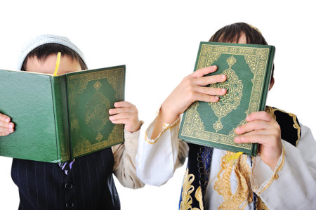 Two boys with holy Quran