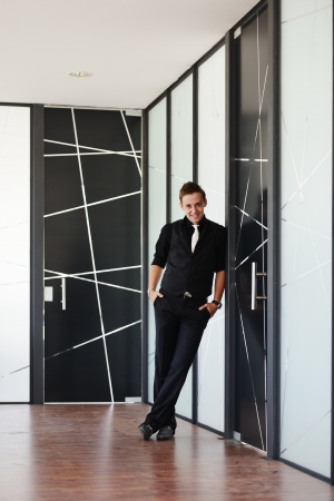 Handsome businessman at officeの写真素材