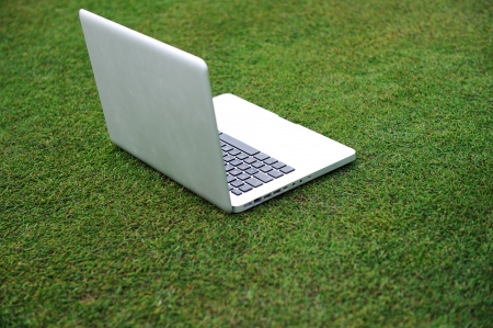 Laptop on grassの写真素材