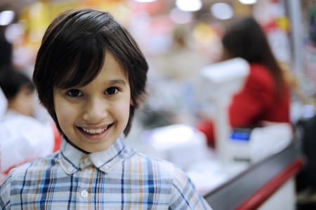 Smiling kid in shoppingの写真素材