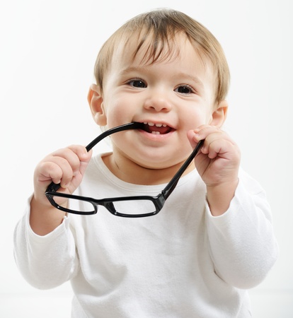 Cute funny baby with glassesの写真素材