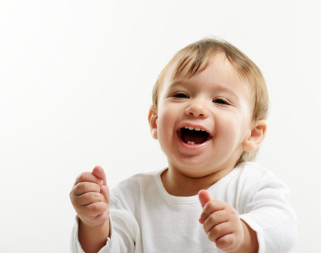 Bright closeup portrait of adorable happy babyの写真素材