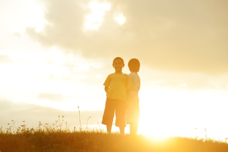 Active two kids spending happy time on summer natureの写真素材