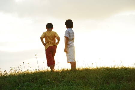 Active two kids spending happy time on summer natureの写真素材