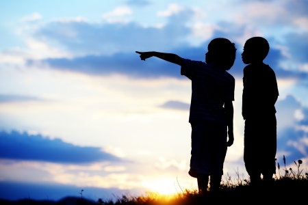 Active kids having happy time looking for their better futureの写真素材