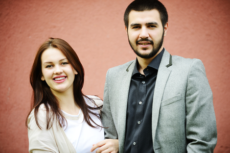 Lovely couple enjoying fall in love at parkの写真素材