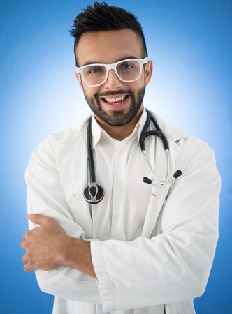 Young doctor on blue の写真素材