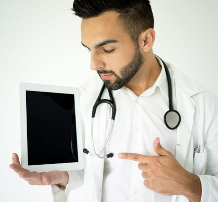 Attractive modern doctor with tabletの写真素材