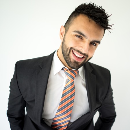 Portrait of attractive man posing on white の写真素材