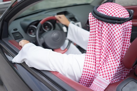 Arabic young businessman driving carの写真素材