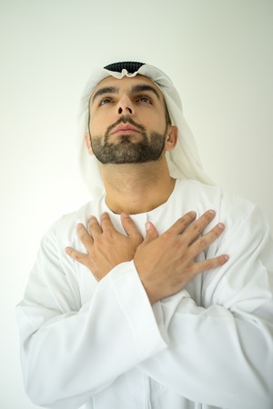 Arabic Muslim young man prayingの写真素材