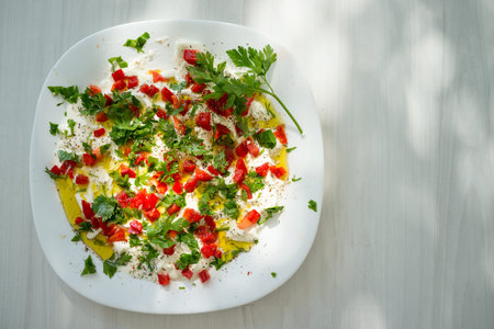 Summer organic kitchen preparing food with vegetable ingredients and creamy cheese