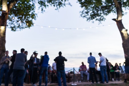 Crowd people together outdoor waiting for sunsetの写真素材