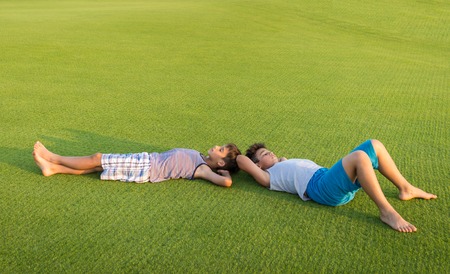 Enyojing on beautiful grass meadowの写真素材