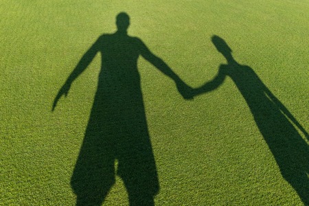 Father and son shadowの写真素材