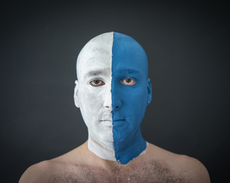 Conceptual artistic face portait photo of a manの写真素材