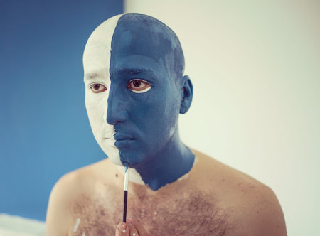 Conceptual artistic face portait photo of a manの写真素材