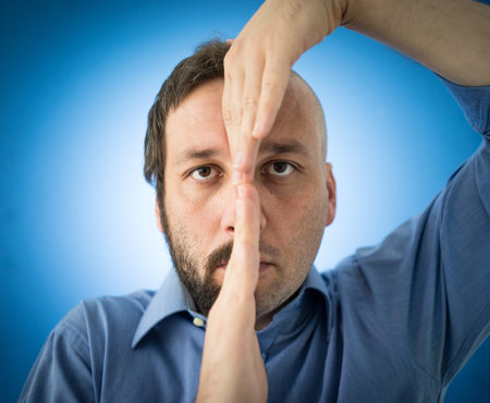 Conceptual artistic face portait photo of a manの写真素材